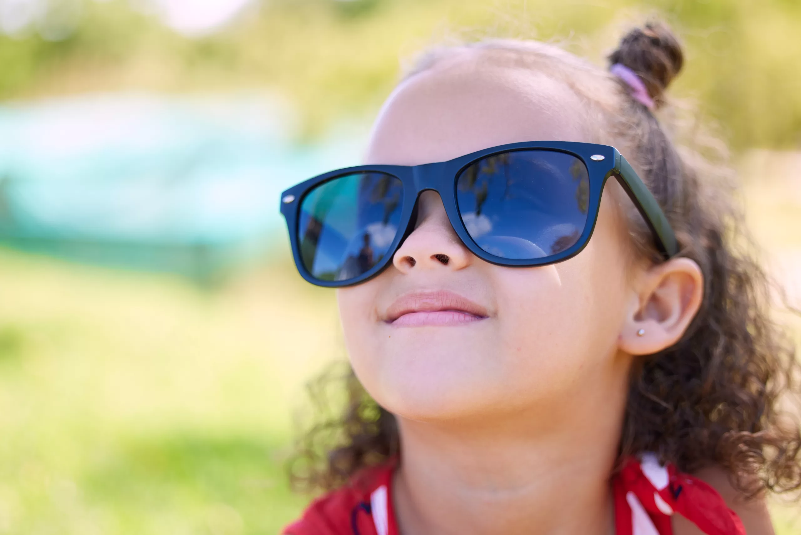 Why Are Sunglasses Important for Children and How Do They Provide UV Protection for Young Eyes?